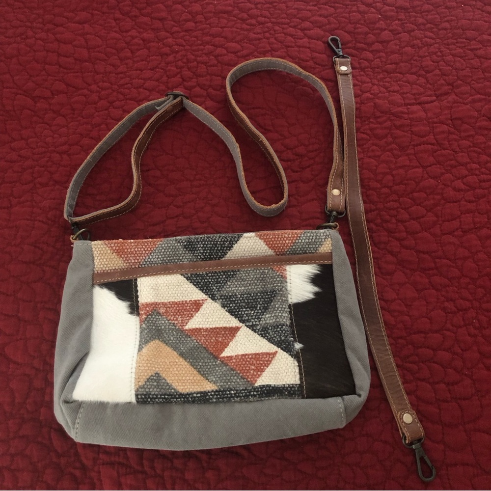 Myra Bag with gray, rust and cream pattern detail. Zippered pockets. Like new.